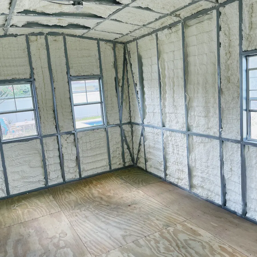 Closed-cell spray foam insulation applied to wall cavities in a residential project in Ridgeway